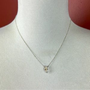 Luna Norte clear and black flecked crystal necklace on a silver dainty chain